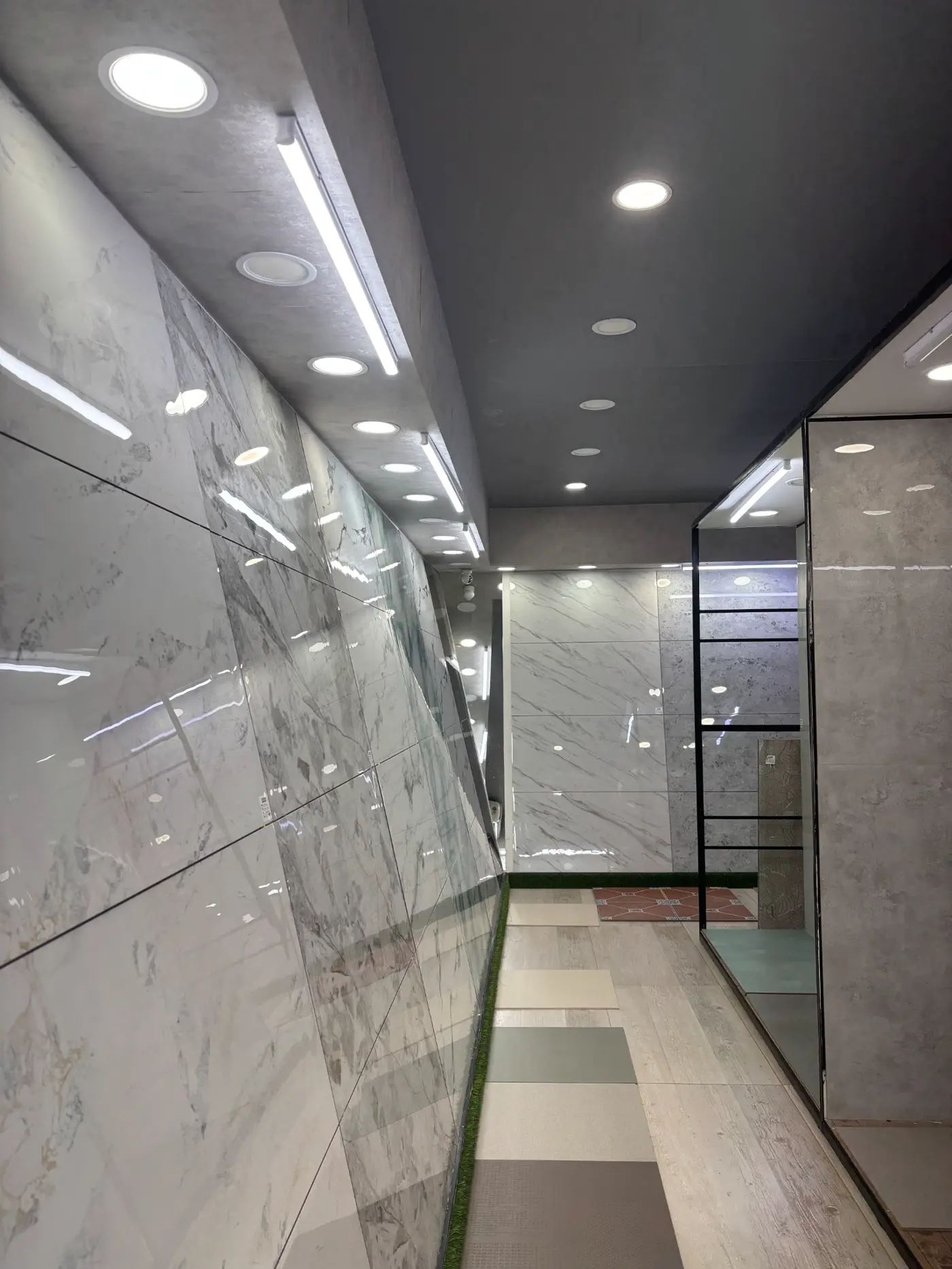 Tile displays inside CEEYEM Traders showroom in Kuthuparamba